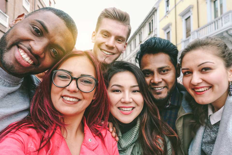 a group of students looking at the camera and smiling